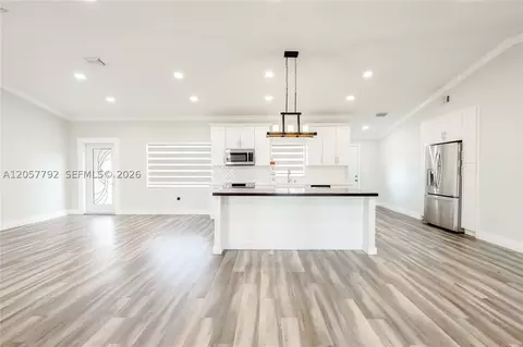Living - 6320 NW 199th St, Hialeah, FL 33015 photo 4 of 7