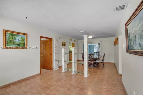 Living - 267 E 56th St, Hialeah, FL 33013 photo 1 of 2