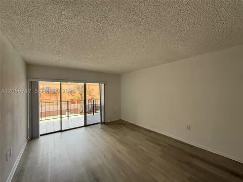 Living - 1900 W 68th St #B203, Hialeah, FL 33014 photo 2 of 3