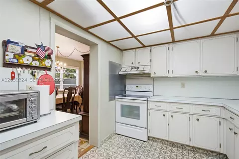 Kitchen - 921 E 14 St, Hialeah, FL 33010 photo 2 of 2