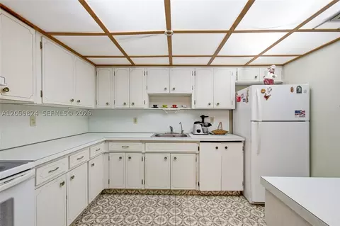 Kitchen - 921 E 14 St, Hialeah, FL 33010 photo 1 of 2