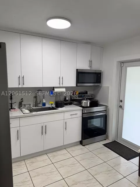Kitchen - 80 W 56th St, Hialeah, FL 33012 photo 2 of 4