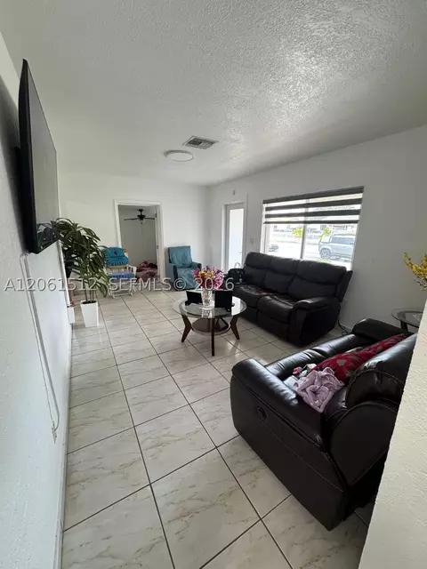 Living - 80 W 56th St, Hialeah, FL 33012 photo 2 of 3