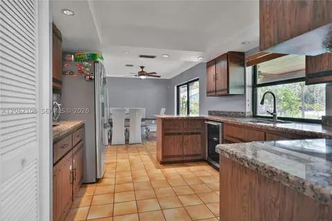 Kitchen - 2587 E Rd, Loxahatchee, FL 33470 photo 2 of 4