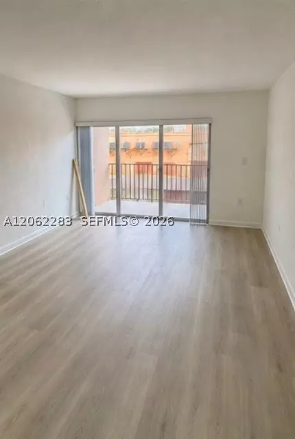 Living - 1900 W 68th St #B203, Hialeah, FL 33014 photo 2 of 2