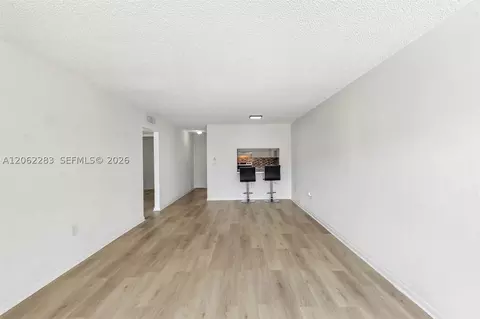 Living - 1900 W 68th St #B203, Hialeah, FL 33014 photo 4 of 13