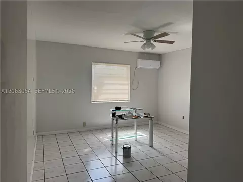 Living - 562 E 44th St, Hialeah, FL 33013 photo 2 of 4