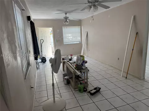 Living - 562 E 44th St, Hialeah, FL 33013 photo 3 of 4