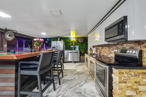 Kitchen - 831 E 10th Pl, Hialeah, FL 33010 photo 8 of 9