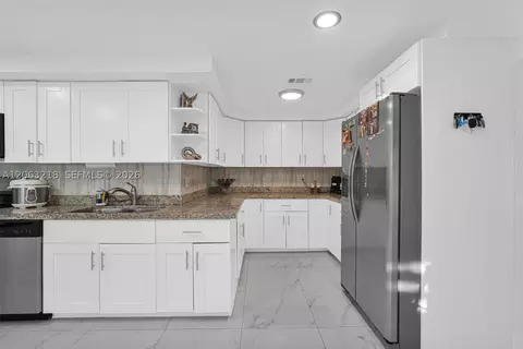 Kitchen - 831 E 10th Pl, Hialeah, FL 33010 photo 5 of 9