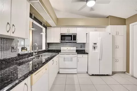 Kitchen - 7566 Red Ruby Dr, Delray Beach, FL 33446 photo 1 of 4