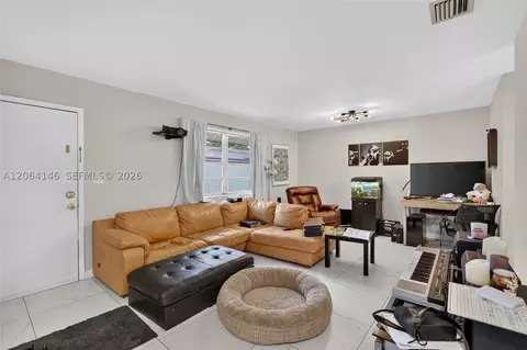 Living - 210 E 10th St, Hialeah, FL 33010 photo 3 of 5