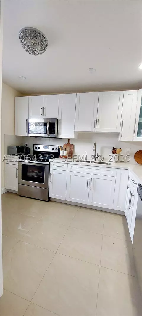 Kitchen - 17063 NW 56th Ct, Miami Gardens, FL 33055 photo 2 of 3