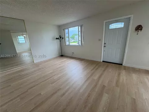 Living - 648 E 40th St, Hialeah, FL 33013 photo 2 of 3