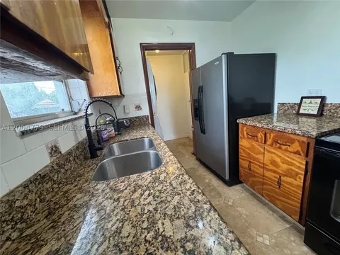 Kitchen - 648 E 40th St, Hialeah, FL 33013 photo 1 of 4