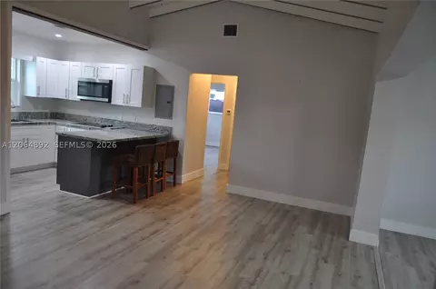 Living - 4035 E 2nd Ave, Hialeah, FL 33013 photo 3 of 5