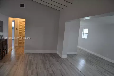 Living - 4035 E 2nd Ave, Hialeah, FL 33013 photo 1 of 5