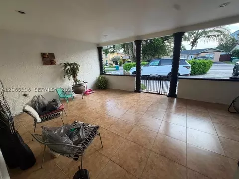 Exterior - 19631 NW 57th Pl, Hialeah, FL 33015 photo 7 of 11