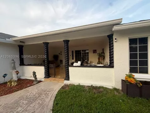 Exterior - 19631 NW 57th Pl, Hialeah, FL 33015 photo 10 of 11