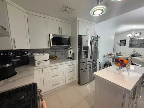 Kitchen - 19631 NW 57th Pl, Hialeah, FL 33015 photo 2 of 4