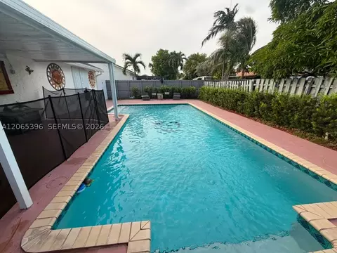 Exterior - 19631 NW 57th Pl, Hialeah, FL 33015 photo 9 of 11