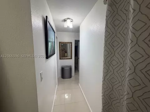 Entry Way - 19631 NW 57th Pl, Hialeah, FL 33015 photo 4 of 6