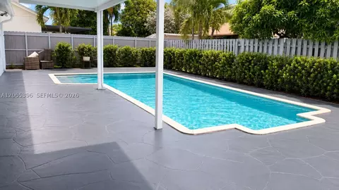 Exterior - 19631 NW 57th Pl, Hialeah, FL 33015 photo 2 of 6
