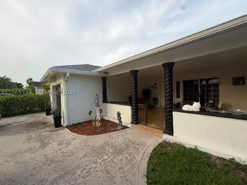 Exterior - 19631 NW 57th Pl, Hialeah, FL 33015 photo 6 of 11