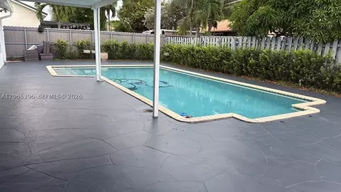Exterior - 19631 NW 57th Pl, Hialeah, FL 33015 photo 3 of 6