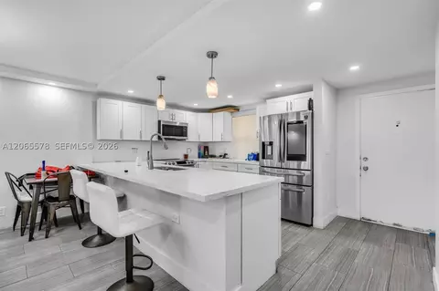 Kitchen - 141 SE 3rd Ave #101, Dania Beach, FL 33004 photo 3 of 4