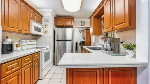 Kitchen - 154 W 59th St, Hialeah, FL 33012 photo 1 of 2
