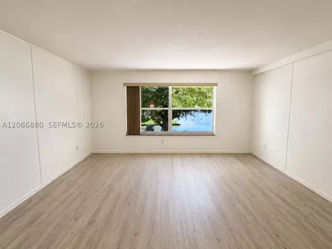 Living - 1720 W 75th St, Hialeah, FL 33014 photo 2 of 2