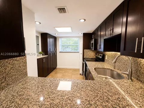Kitchen - 1720 W 75th St, Hialeah, FL 33014 photo 2 of 2