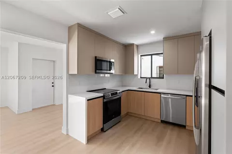 Kitchen - 31 W 64th St, Hialeah, FL 33012 photo 2 of 2