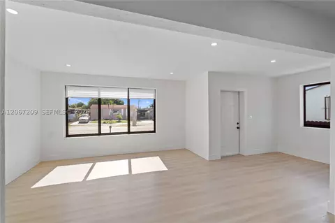 Living - 31 W 64th St, Hialeah, FL 33012 photo 3 of 9