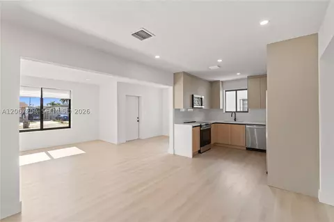 Living - 31 W 64th St, Hialeah, FL 33012 photo 8 of 9