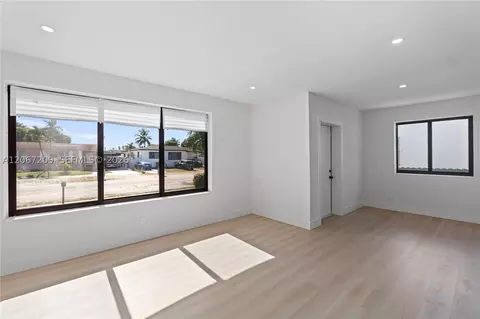 Living - 31 W 64th St, Hialeah, FL 33012 photo 2 of 9