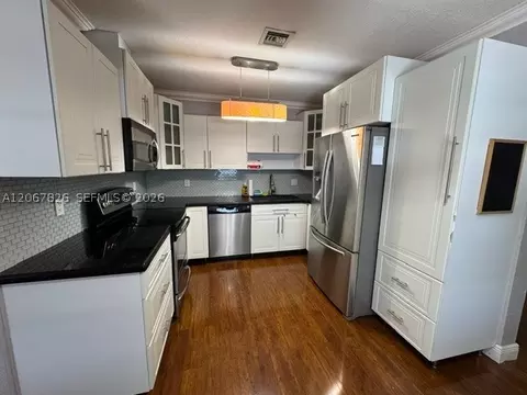 Kitchen - 740 SE 4th Pl, Hialeah, FL 33010 photo 2 of 3