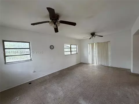 Living - 733 W 35th St, Hialeah, FL 33012 photo 5 of 6