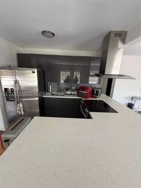 Kitchen - 3311 NW 16th Ter, Miami, FL 33125 photo 5 of 6