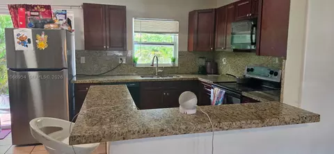 Kitchen - 601 W Sample Rd, Pompano Beach, FL 33064 photo 1 of 1
