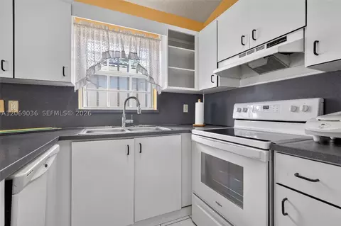 Kitchen - 6983 W 24th Ln, Hialeah, FL 33016 photo 1 of 2
