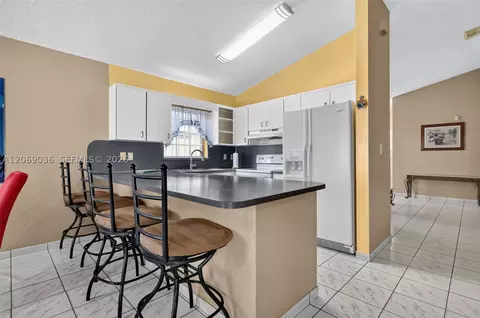 Kitchen - 6983 W 24th Ln, Hialeah, FL 33016 photo 2 of 2