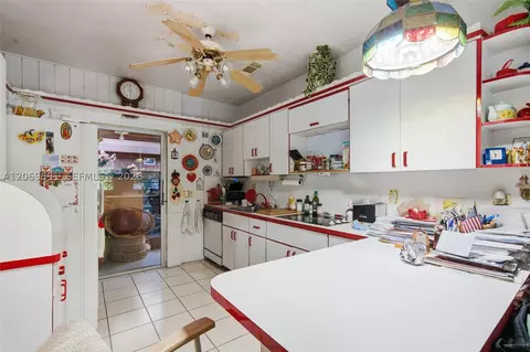 Kitchen - 621 SE 4th St, Hialeah, FL 33010 photo 2 of 3