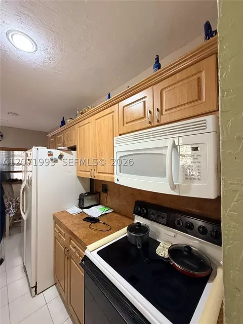 Kitchen - 733 E 26th St, Hialeah, FL 33013 photo 1 of 4