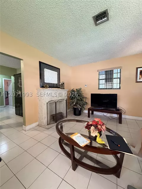 Living - 733 E 26th St, Hialeah, FL 33013 photo 1 of 3