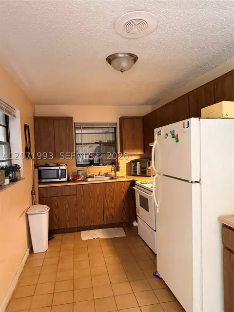 Kitchen - 733 E 26th St, Hialeah, FL 33013 photo 4 of 4