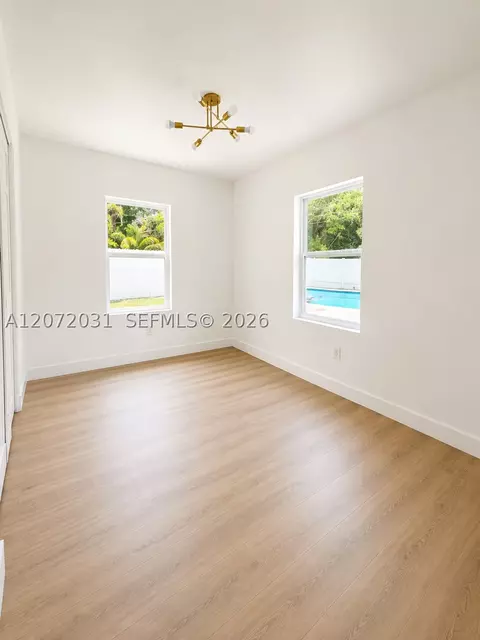 Bedroom - 1870 NE 154th Ter, North Miami Beach, FL 33162 photo 2 of 5