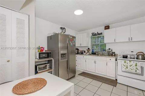 Kitchen - 334 E 11th St, Hialeah, FL 33010 photo 5 of 6