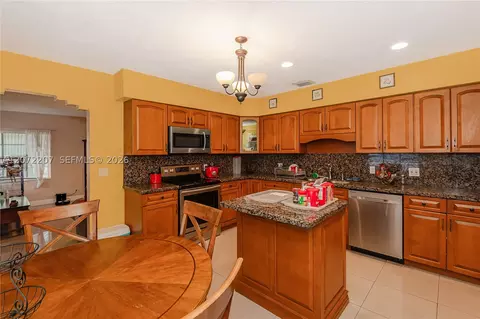 Kitchen - 334 E 11th St, Hialeah, FL 33010 photo 2 of 6